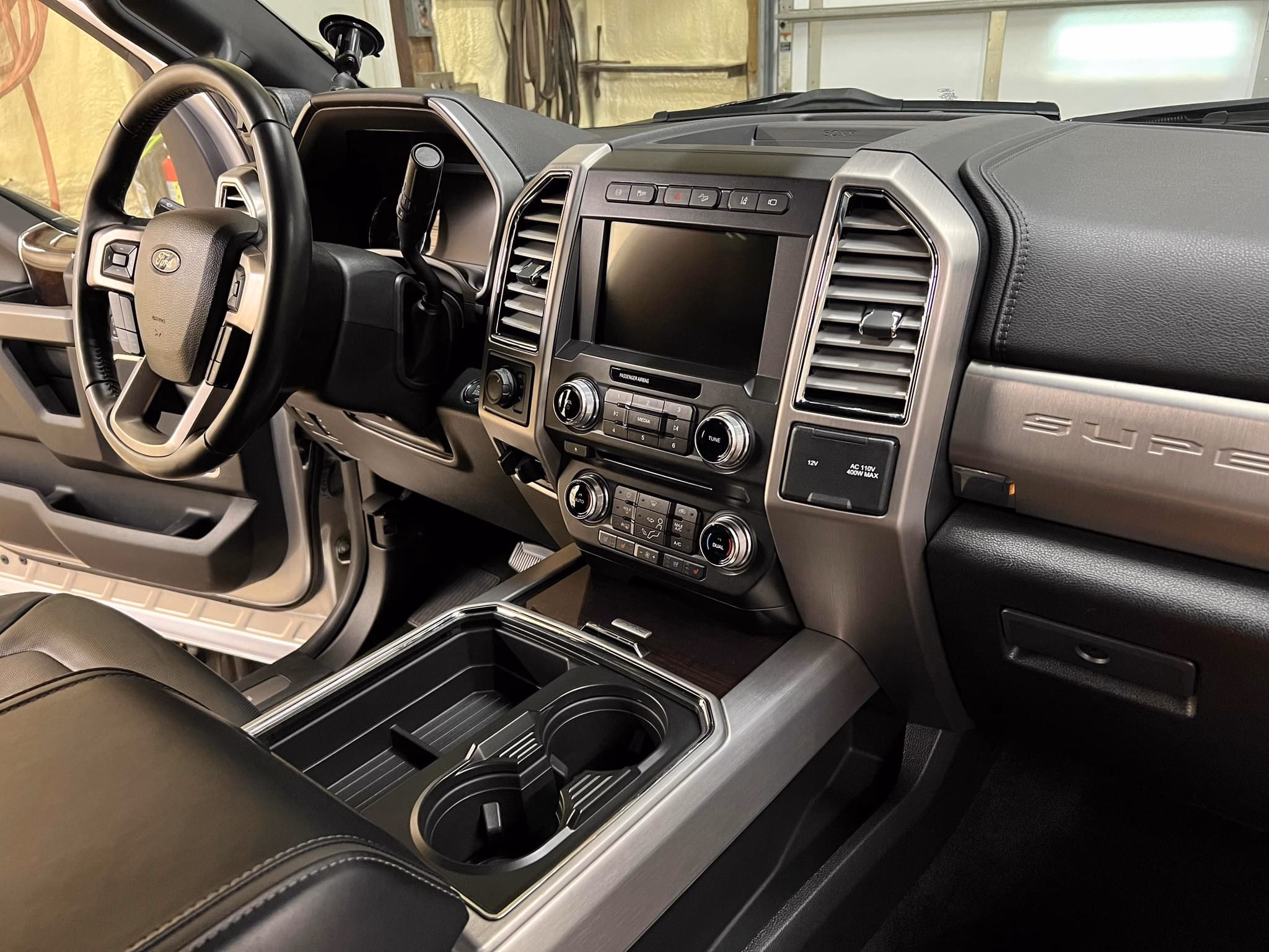 Ford F-Series Super Duty — interior reset, dash and console deep-cleaned.