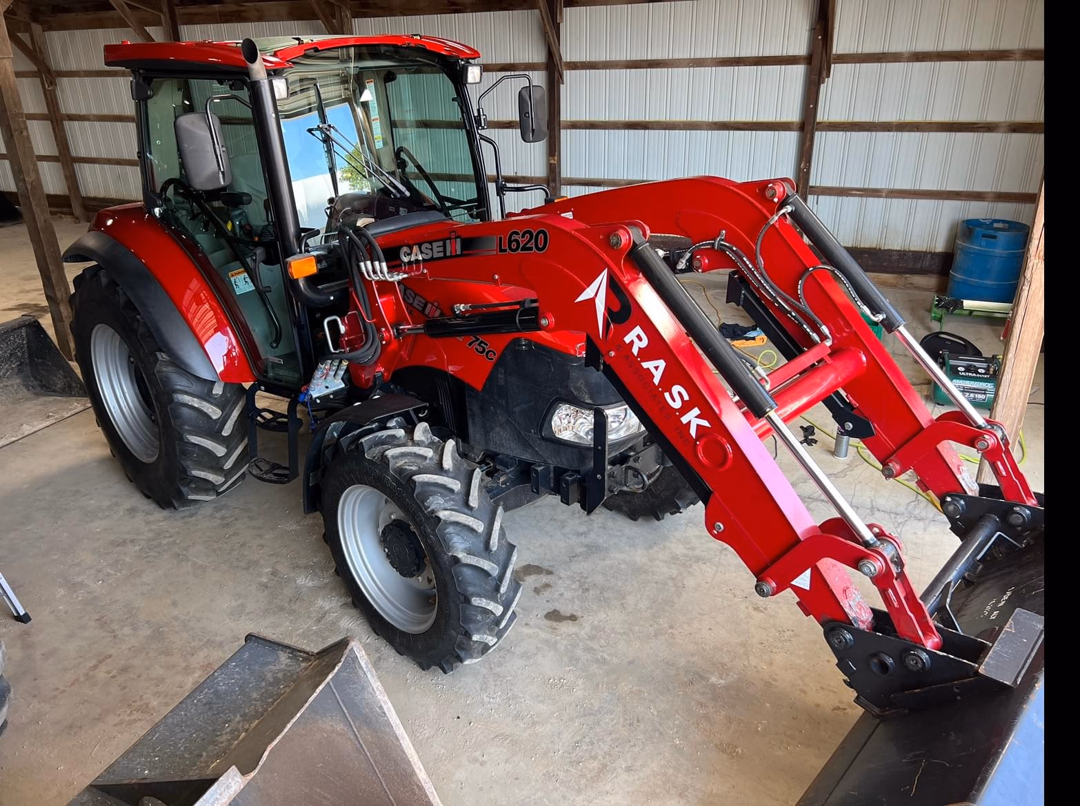 John Deere 310K EP — full ceramic coating, on-site at the yard.