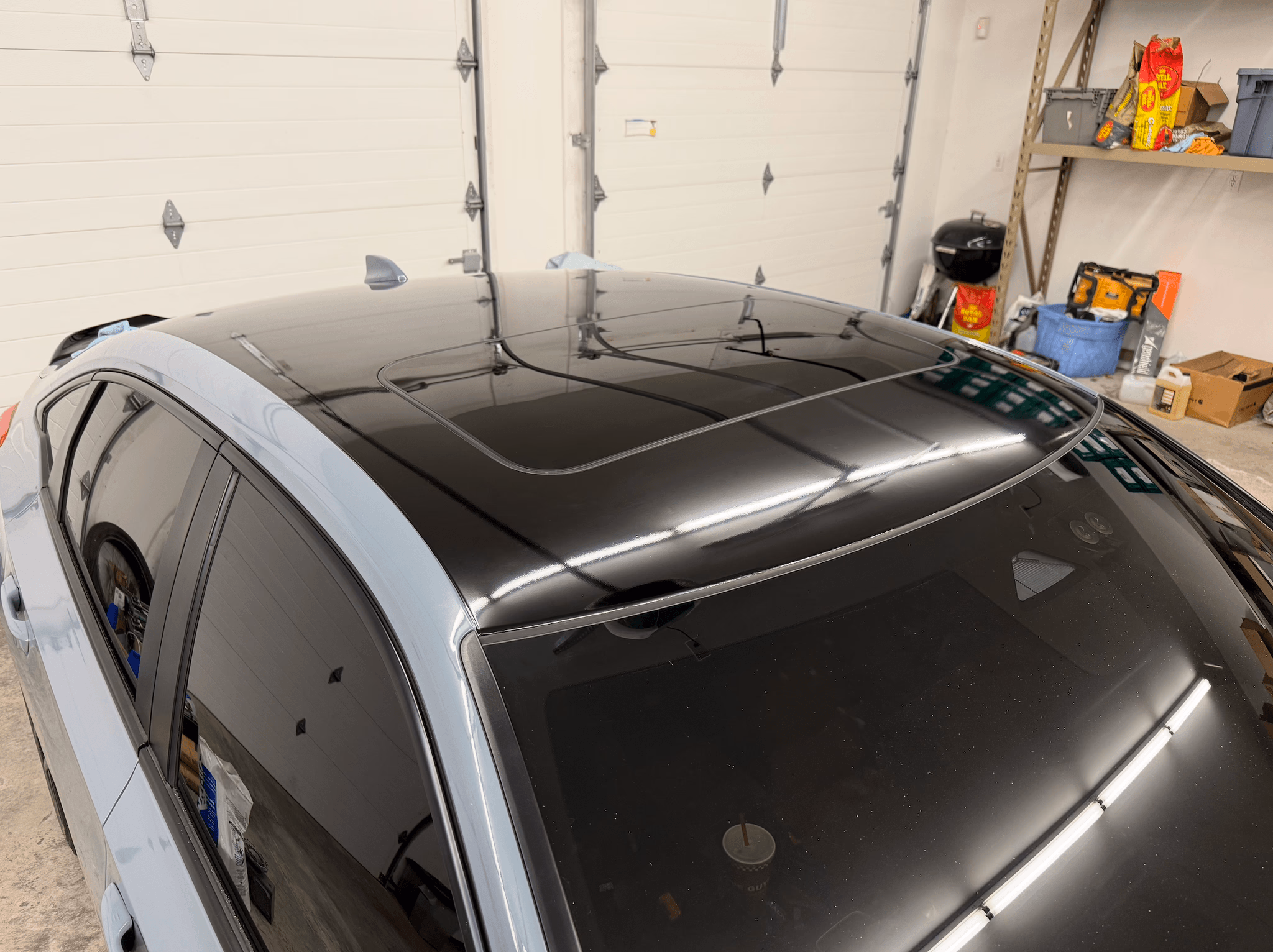 Roof and pillars complete — gloss black on factory color.